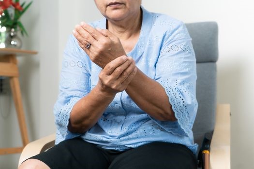 A woman suffering from chronic wrist pain